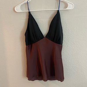 Open back silk free people tank. Very flattering:) fits xs-s